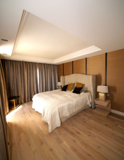 C2 Master bedroom with wooden floor and wall panels upstairs